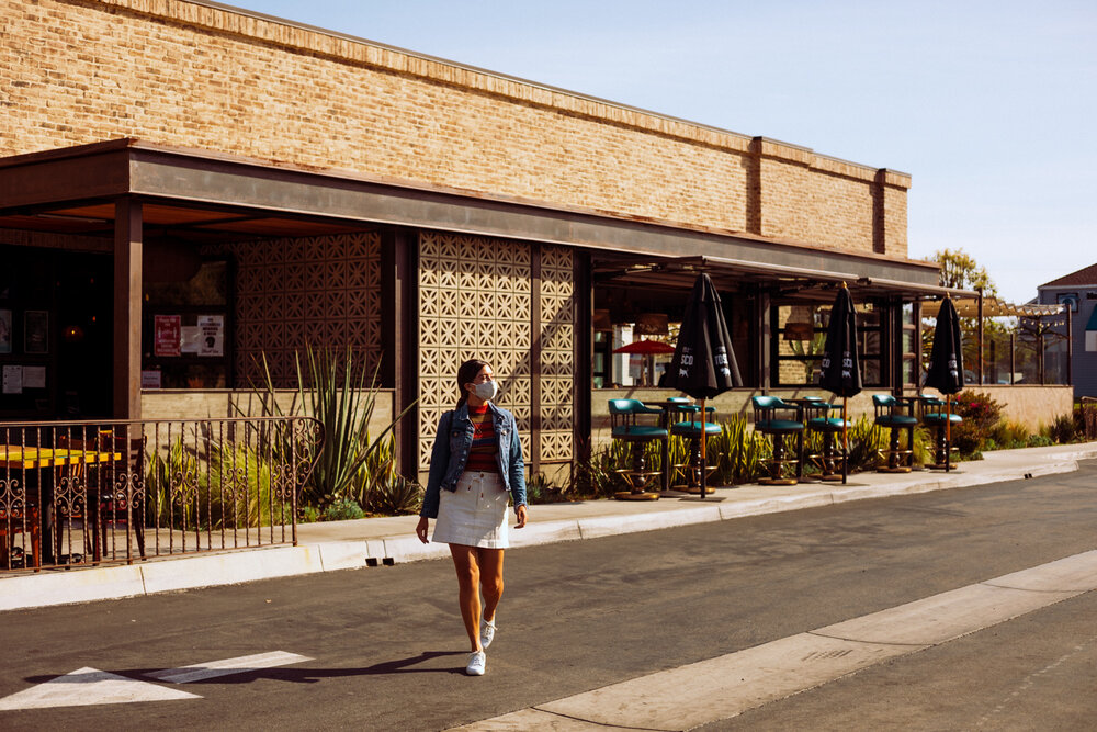 Rachel Off Duty: A Woman Walking Out of a Restaurant in Costa Mesa