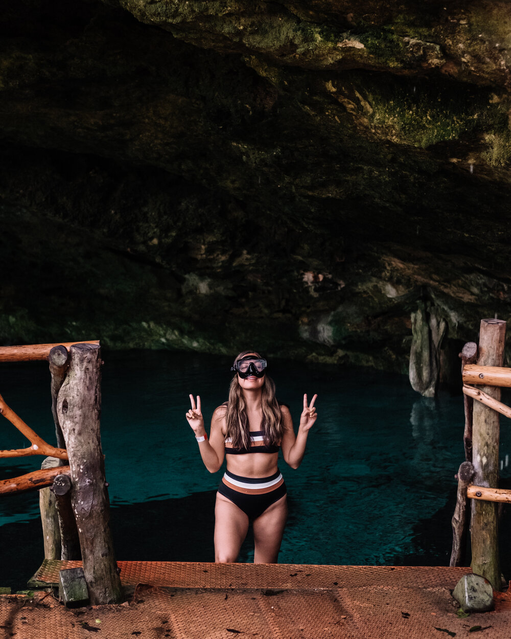 Rachel Off Duty: A Woman Preparing to Swim at Cenote Dos Ojos, Tulum, Mexico