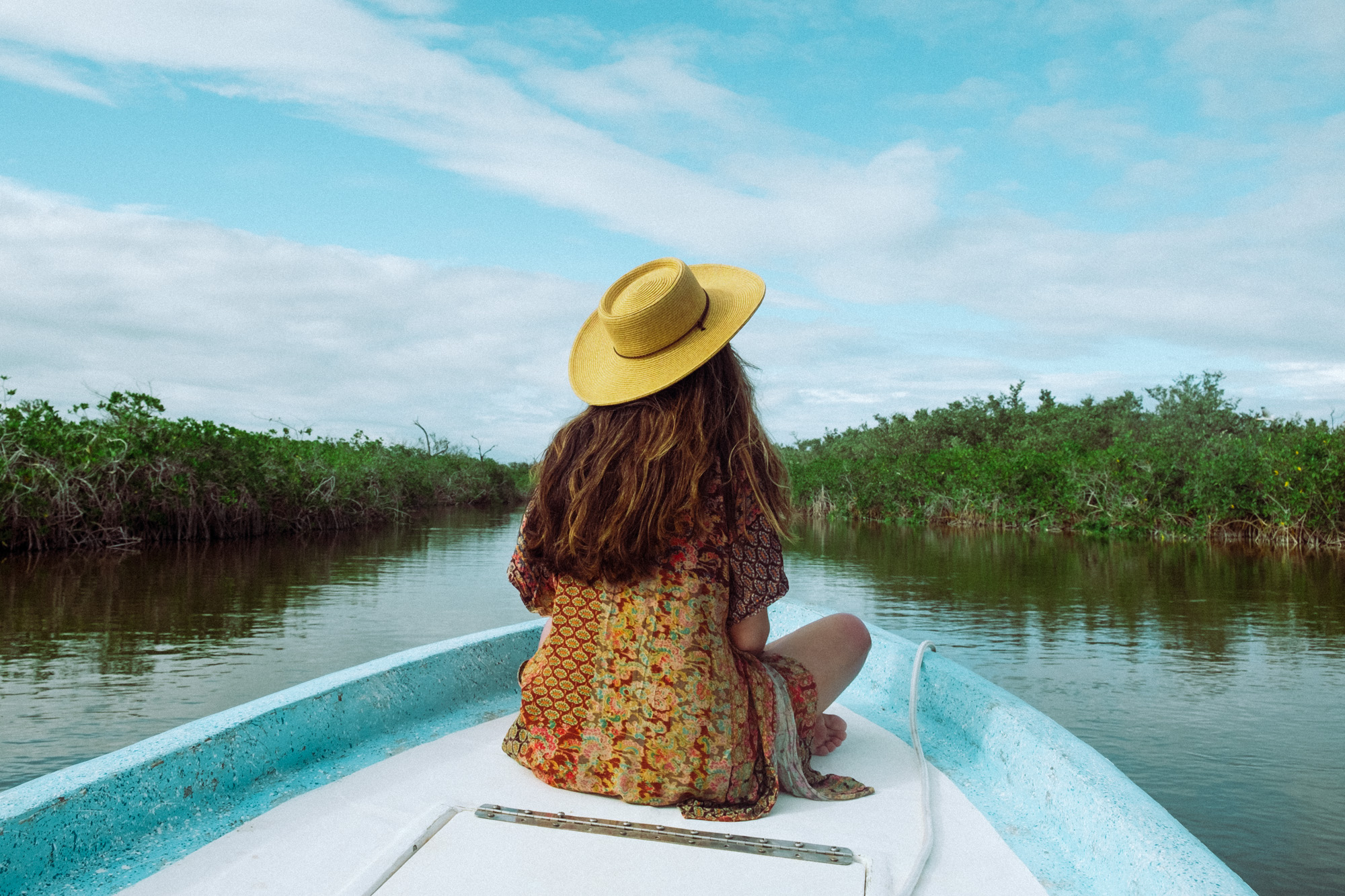 Rachel Off Duty: A Woman On a Boat in the Mangroves at Sian Ka'an, Mexico