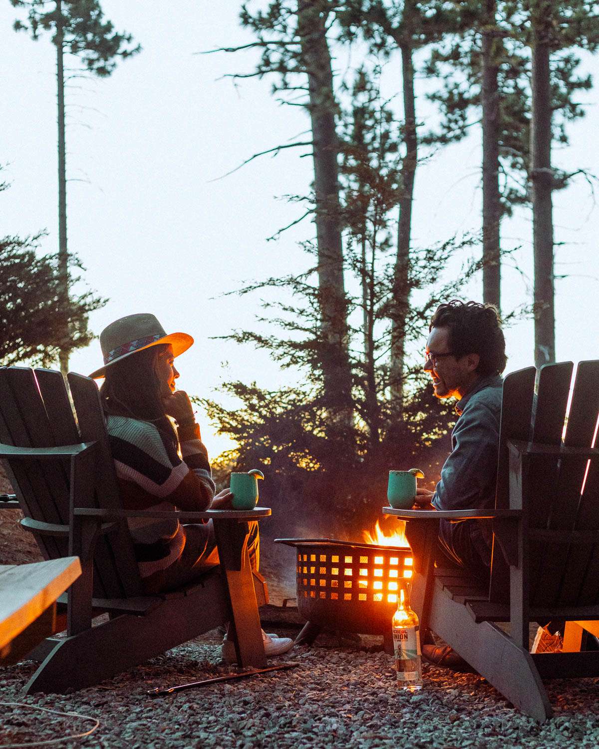 Rachel Off Duty: Couple Enjoying a Campfire at Dusk
