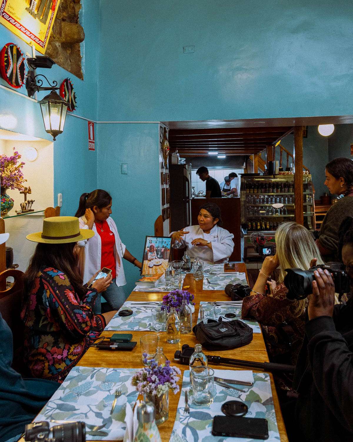 Rachel Off Duty: A Group of Diners Talking in Mama Seledonia, Cusco